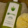 Champú de aloe vera Kamel junto a esponja natural