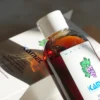 Loción capilar con vinagre Kamel junto a su caja
